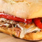 De lomo, pimientos rojos y alioli