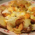 Huevos Rotos con Foie Fresco y Sal Maldon